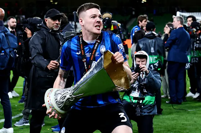 Emil Holm of Atalanta BC lifts the trophy as he celebrates