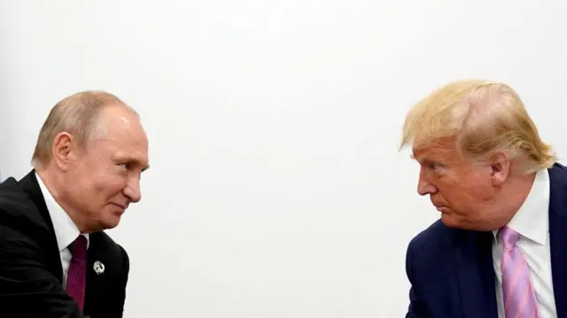 Putin and Trump look at one another against a white backdrop