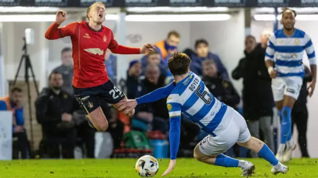 Greenock Morton's Morgan Boyes (R) fouls Falkirk's Calvin Miller (L) during a William Hill Championship match between Greenock Morton and Falkirk at Cappielow Park, on February 21, 2025, in Greenock, Scotland. (Photo by Mark Scates / SNS Group)