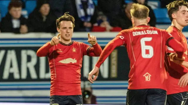 Falkirk's Ethan Ross celebrates scoring to make it 2-0 during a William Hill Championship match between Greenock Morton and Falkirk at Cappielow Park, on February 21, 2025, in Greenock, Scotland. (Photo by Mark Scates / SNS Group)