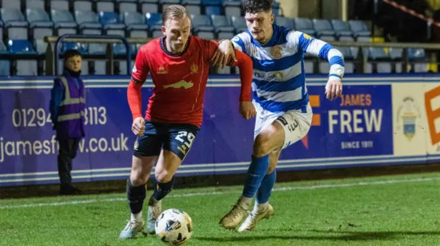 Falkirk's Calvin Miller (L) and Greenock Morotn's Zak Delaney (R) in action during a William Hill Championship match between Greenock Morton and Falkirk at Cappielow Park, on February 21, 2025, in Greenock, Scotland. (Photo by Mark Scates / SNS Group)