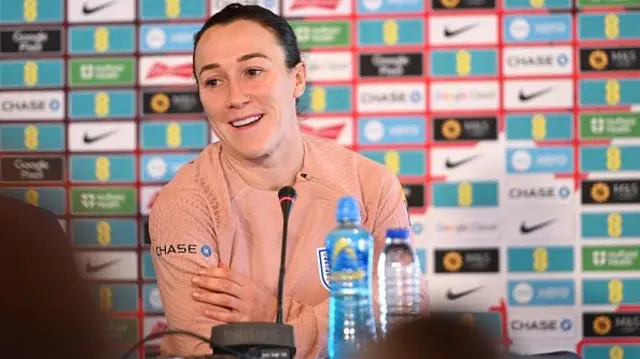 Lucy Bronze of England speaks to the media