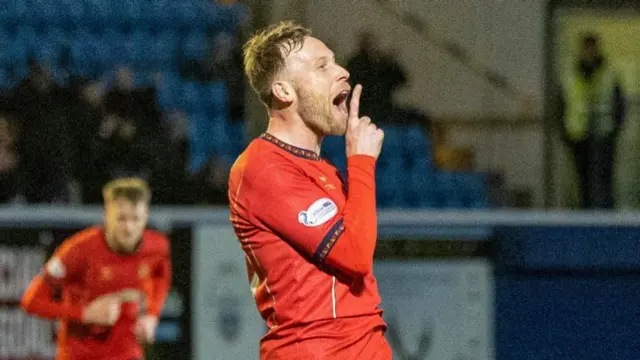 Falkirk's Scott Arfield celebrates scoring to make it 1-0 during a William Hill Championship match between Greenock Morton and Falkirk at Cappielow Park, on February 21, 2025, in Greenock, Scotland. (Photo by Mark Scates / SNS Group)