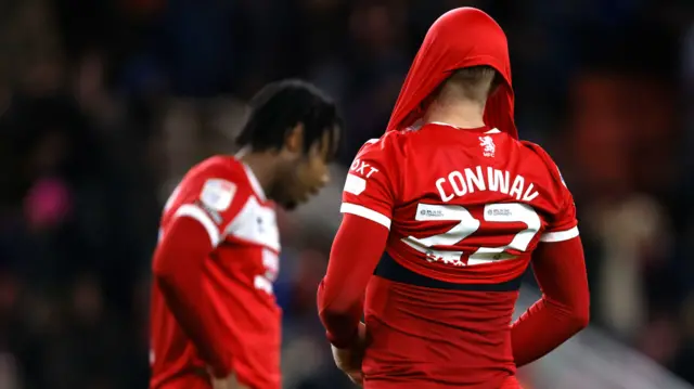 Tommy Conway with his Middlesbrough shirt raised above his head