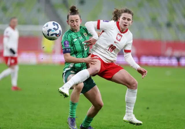 Rebecca McKenna challenges for the ball