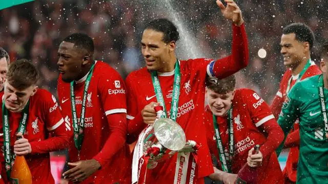 iverpool captain Virgil Van Dijk with the trophy