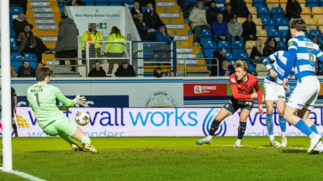 Falkirk's Calvin Miller (R) has a shot saved by Greencok Morton's Ryan Mullen (L) during a William Hill Championship match between Greenock Morton and Falkirk at Cappielow Park, on February 21, 2025, in Greenock, Scotland. (Photo by Mark Scates / SNS Group)