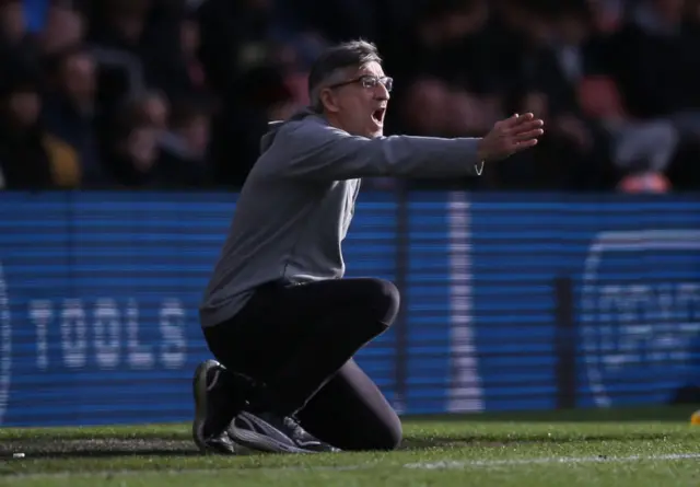 Juric waves instructions from the touchline