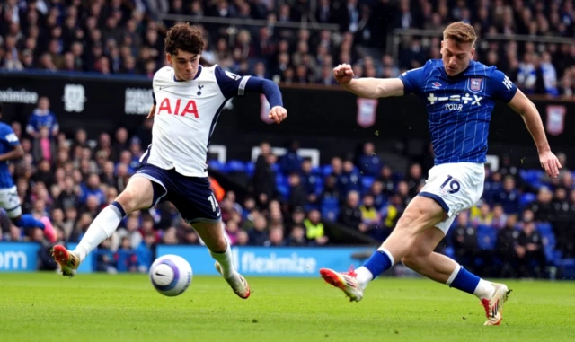 Ipswich Town's Liam Delap (right) shoots under pressue