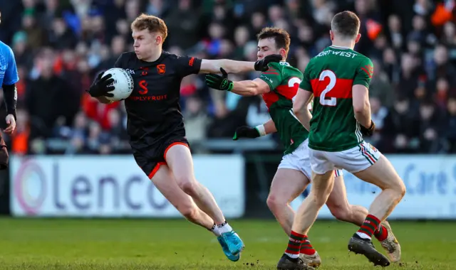 Conor Turbitt wins possession for Armagh against Mayo