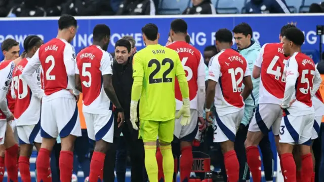 Mikel Arteta speaks to his Arsenal players