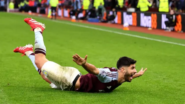 Marco Asensio celebrates