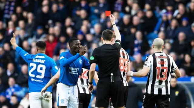 Referee Kevin Clancy shows a red card to Rangers Hamza Igamane during a William Hill Premiership match between Rangers and St Mirren at Ibrox Stadium, on February 22, 2025, in Glasgow, Scotland.  (Photo by Rob Casey / SNS Group)