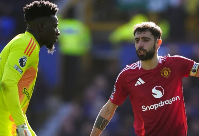 Manchester United's Bruno Fernandes and goalkeeper Andre Onana