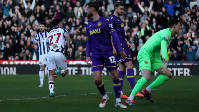 Alex Mowatt celebrates scoring