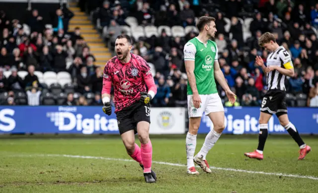 Jordan Smith celebrates a great save at St Mirren