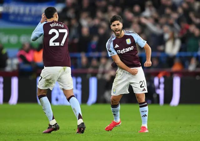 Asensio celebrates his first villa goal with Rogers