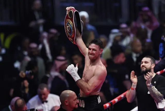 Callum Smith holds up the WBO 'interim' light-heavyweight title