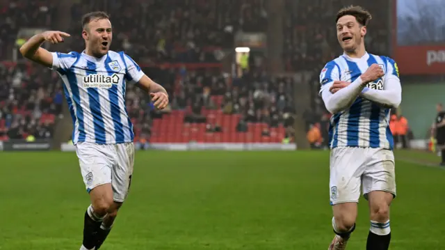 Huddersfield's Herbie Kane celebrates scoring against Barnsley