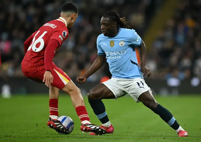 Trent Alexander-Arnold and Jeremy Doku
