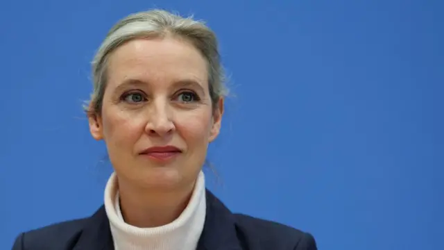 Alice Weidel in a turtle neck top with suit jacket at a press conference in Berlin