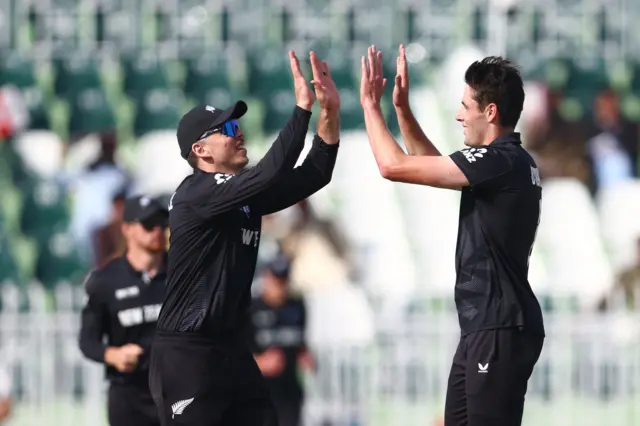 Will O'Rourke celebrates the wicket of Mehidy Hasan Miraz