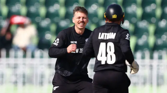 New Zealand's Michael Bracewell celebrates the wicket of Bangladesh's Tanzid Hasan