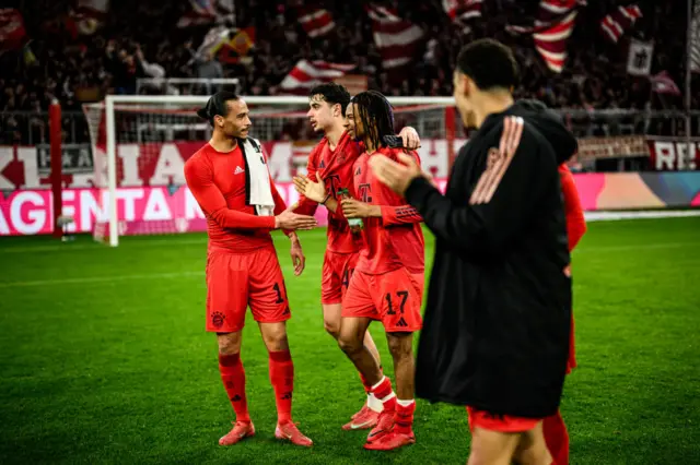 Bayern Munich's Leroy Sane, Aleksandar Pavlovic and Michael Olise