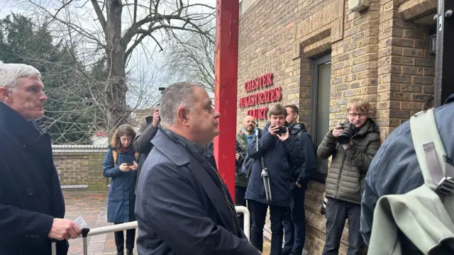 Mike Amesbury stands outside Chester Magistrates' Court