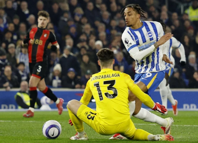 AFC Bournemouth's Kepa Arrizabalaga fouls Brighton & Hove Albion's Joao Pedro