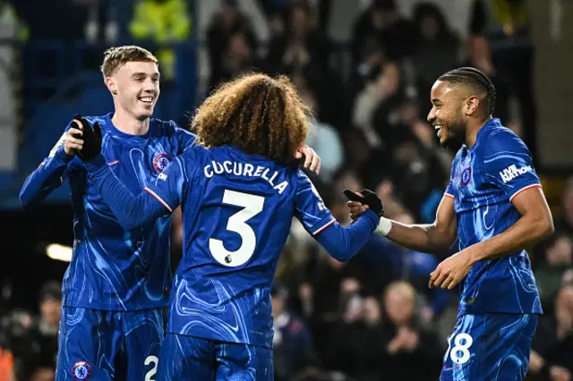 Marc Cucurella (C) celebrates