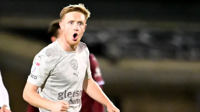 Barnsley midfielder Davis Keillor-Dunn (40) scores a goal and celebrates