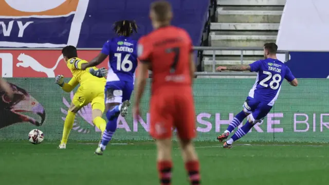 Dale Taylor of Wigan Athletic scores to make it 1-0