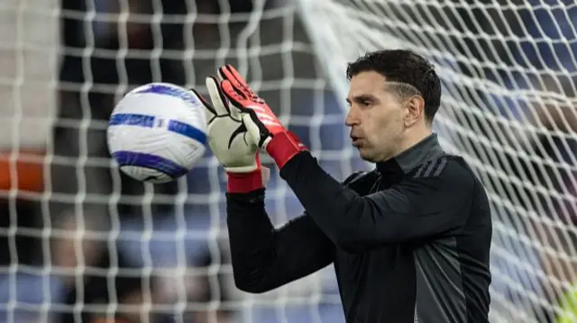 Aston Villa's Emiliano Martinez warming up