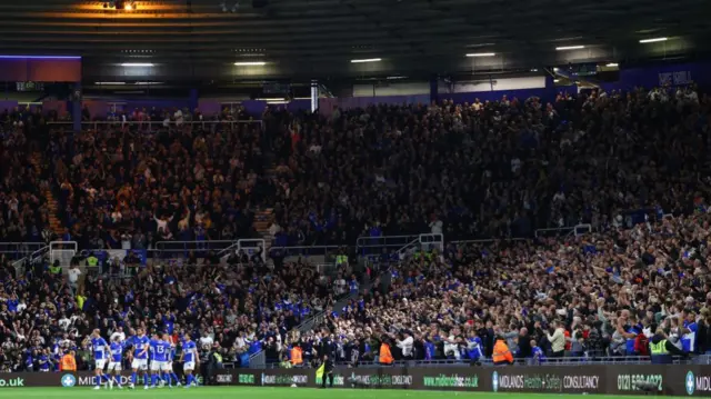 Birmingham City players and fans celebrating a goal