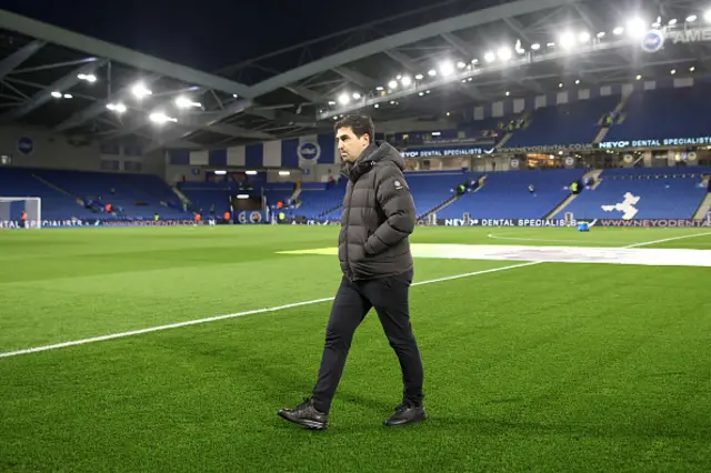 Andoni Iraola, Manager of AFC Bournemouth, inspects the pitch