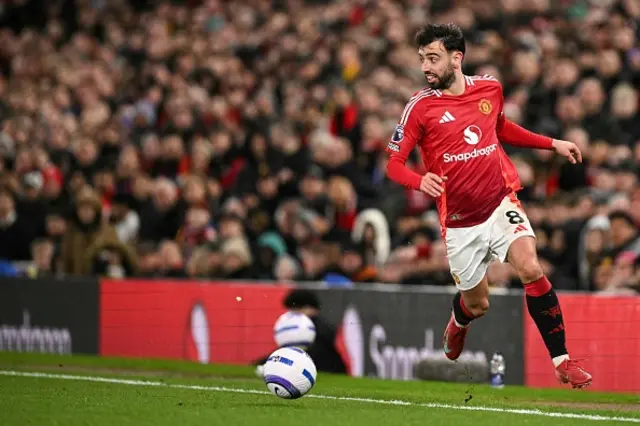 Bruno Fernandes controls the ball