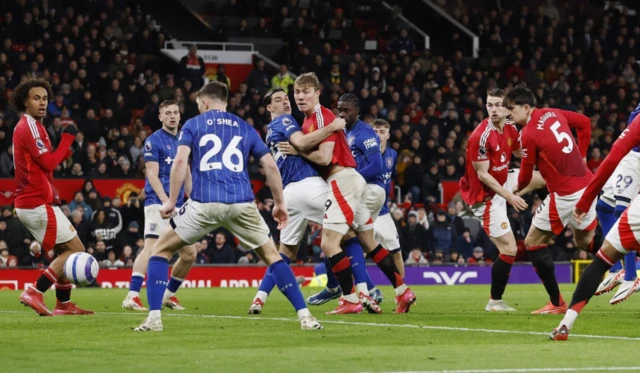 Manchester United's Harry Maguire scores