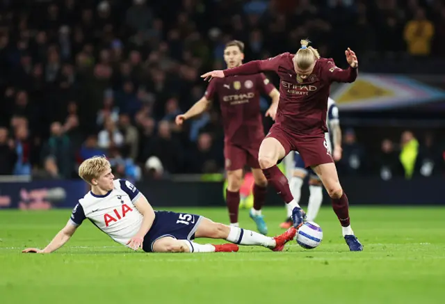 Erling Haaland of Manchester City is challenged by Lucas Bergvall