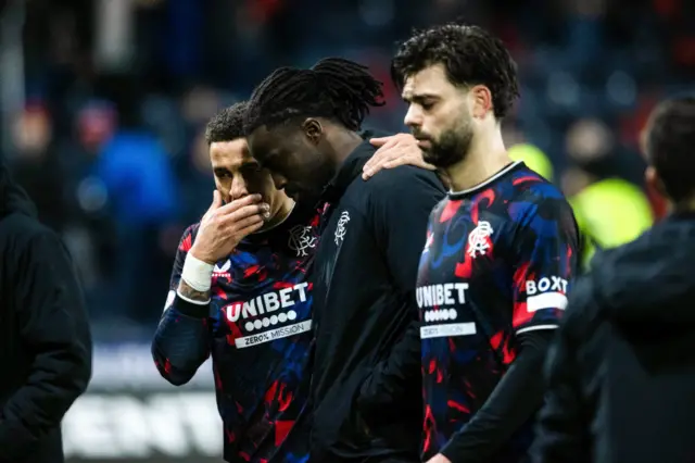 James Tavernier has a word with Clinton Nsiala at full-time