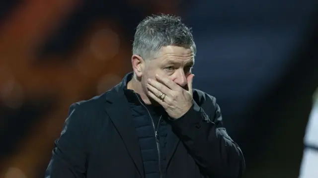 Dundee manager Tony Docherty looks dejected after losing 2-1 to Motherwell.