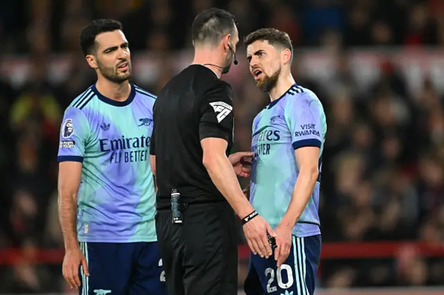 Jorginho of Arsenal speaks to Referee Andrew Madley