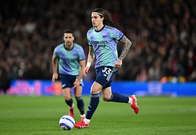 Riccardo Calafiori of Arsenal runs with the ball