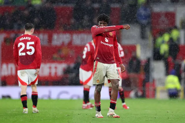 Patrick Chinazaekpere Dorgu of Manchester United looks dejected