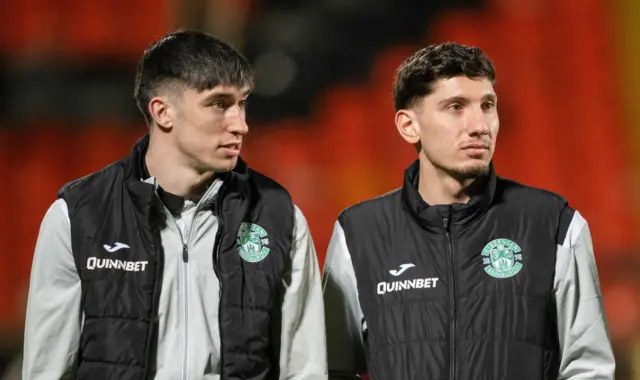 Hibernian's Kieron Bowie and Nectar Triantis during a William Hill Premiership match between Dundee United and Hibernian at the Calforth Construction Arena at Tannadice,