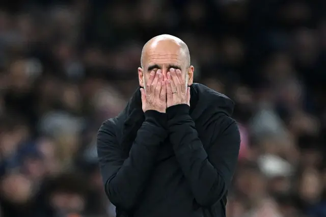 Pep Guardiola, Manager of Manchester City, reacts