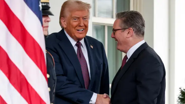 Donald Trump and Keir Starmer shake hands