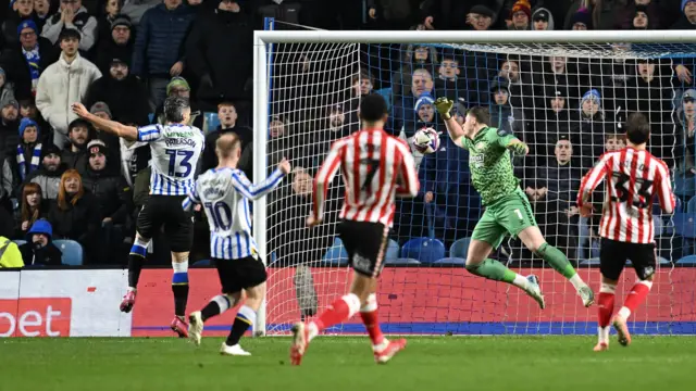 Callum Paterson heads in