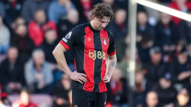Illia Zabarnyi looking sad after being sent off