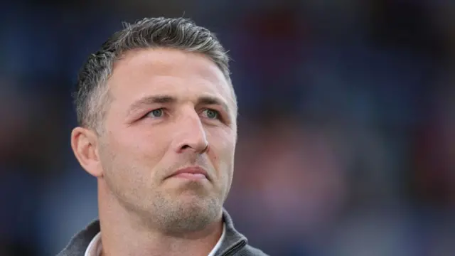 Warrington boss Sam Burgess looks on